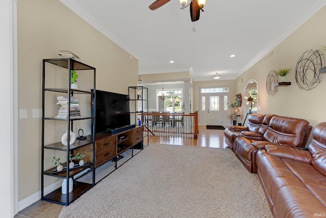 1669 E Brookside Trl, Columbia City, IN 46725 - living area with ornamental molding, ceiling fan, recessed lighting, ornate columns, and a chandelier