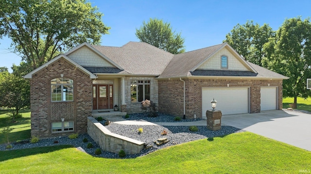 1669 E Brookside Trl, Columbia City, IN 46725 - craftsman house with a garage, a front yard, concrete driveway, brick siding, and roof with shingles