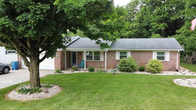 6970 S Maple St, Marion, IN 46953 - ranch-style home featuring an attached garage, concrete driveway, a front yard, and brick siding