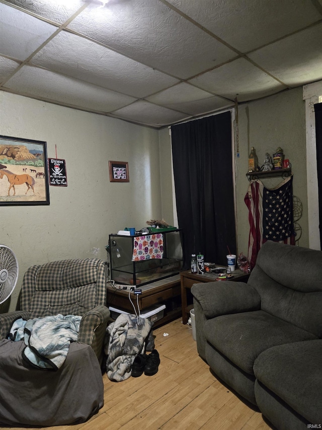 1010-1012 N 9th St, Vincennes, IN 47591 - living room featuring wood finished floors and a paneled ceiling