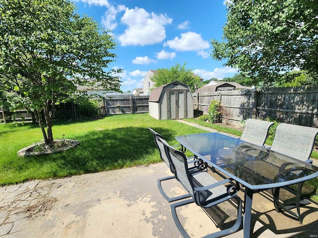 9421 Mill Ridge Run, Fort Wayne, IN 46835 - fenced backyard with a storage shed, outdoor dining area, and a patio