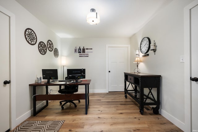 4904 N Hamilton Ln, Muncie, IN 47304 - home office with baseboards and light wood-style flooring