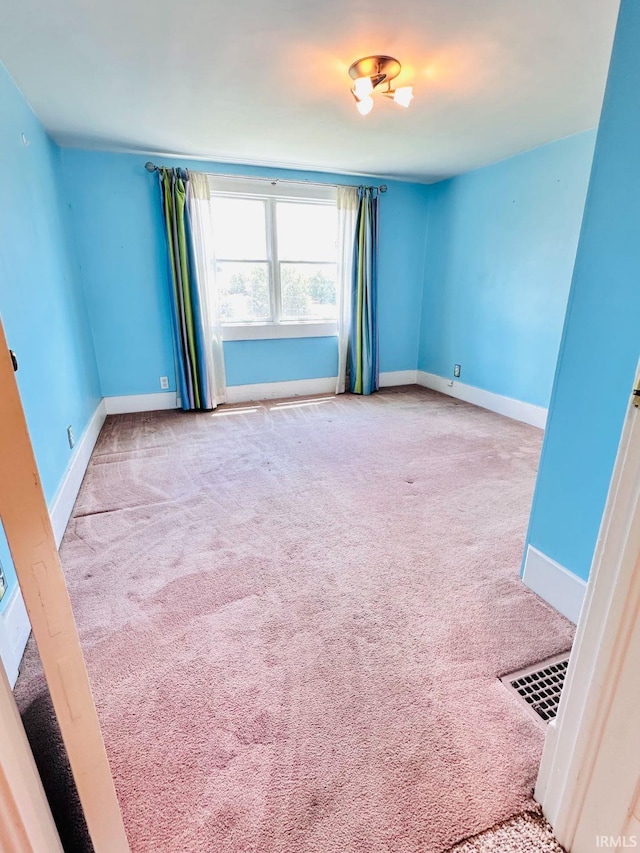 1028 N Wabash Ave, Marion, IN 46952 - spare room featuring carpet flooring