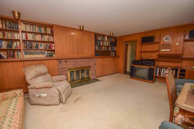 3400 W University Ave, Muncie, IN 47304 - living area featuring wood walls, carpet flooring, and a fireplace