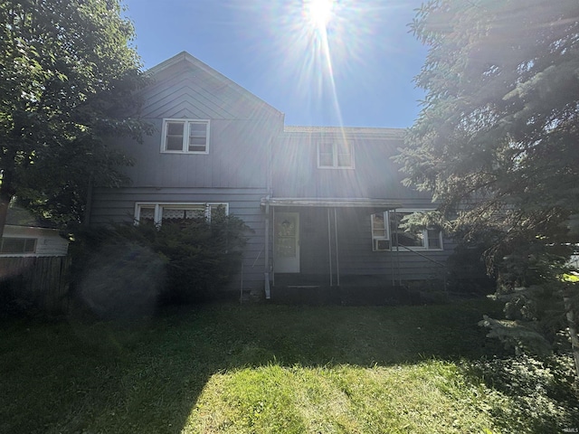 1120 Elm St, Fort Wayne, IN 46808 - back of house featuring a yard