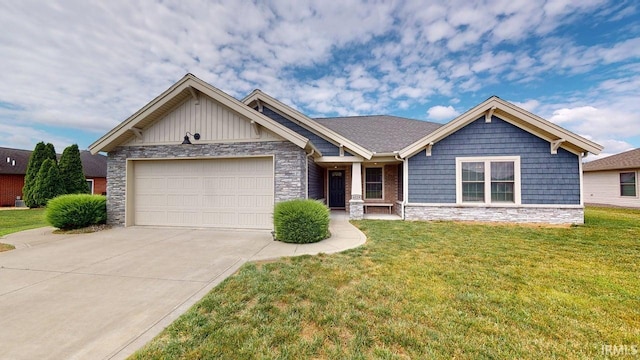 4229 New Birch Dr, Jasper, IN 47546 - craftsman-style home with stone siding, driveway, a garage, a front lawn, and board and batten siding