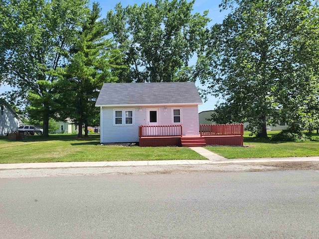 202 Webster St, Monroeville, IN 46773 - bungalow-style home with a deck and a front lawn