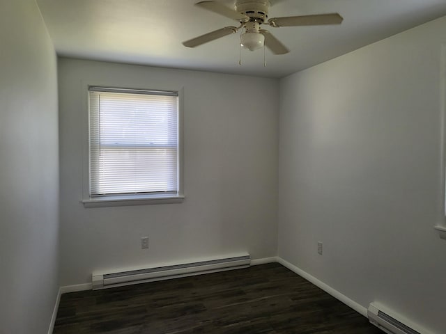 202 Webster St, Monroeville, IN 46773 - unfurnished room featuring a baseboard heating unit, a baseboard radiator, ceiling fan, and dark wood-type flooring