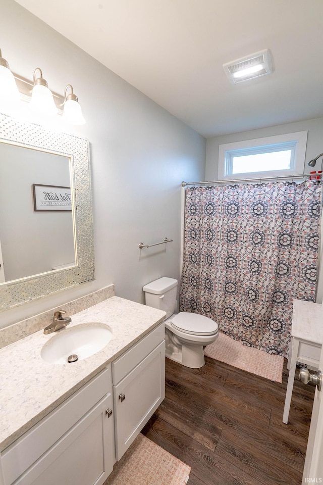 4555 E State Road 66, Cannelton, IN 47520 - full bath with vanity, wood finished floors, and a shower with curtain