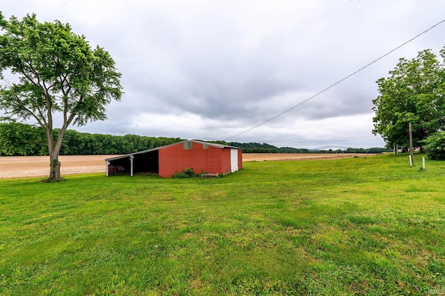 4555 E State Road 66, Cannelton, IN 47520 - view of grassy yard featuring a pole building and an outbuilding
