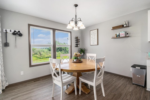 2010 Newbury Cir, Goshen, IN 46526 - dining area with a chandelier and wood finished floors