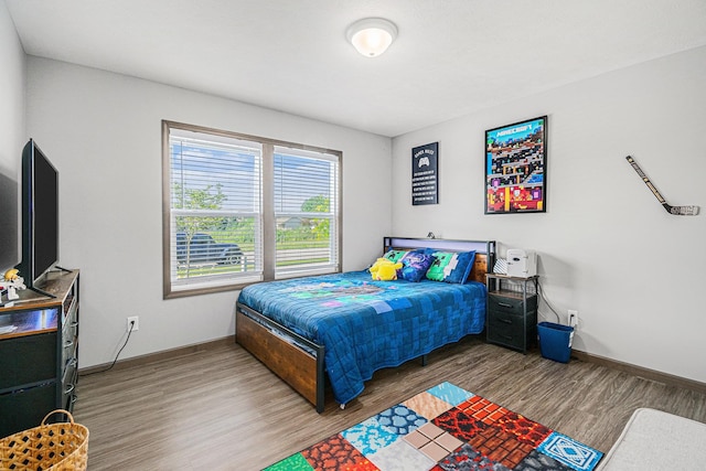 2010 Newbury Cir, Goshen, IN 46526 - bedroom featuring baseboards and wood finished floors