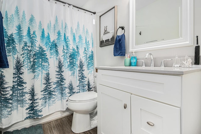 2010 Newbury Cir, Goshen, IN 46526 - full bathroom with vanity, wood finished floors, and shower / tub combo with curtain