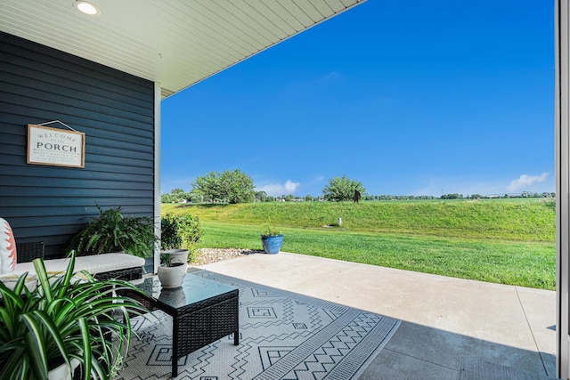 2010 Newbury Cir, Goshen, IN 46526 - view of patio featuring a rural view