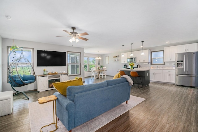 2010 Newbury Cir, Goshen, IN 46526 - living room with dark wood finished floors, ceiling fan, and recessed lighting