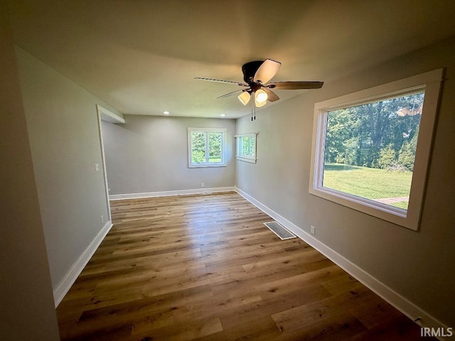 1228 N Main St, Kewanna, IN 46939 - spare room featuring a ceiling fan, wood finished floors, and recessed lighting