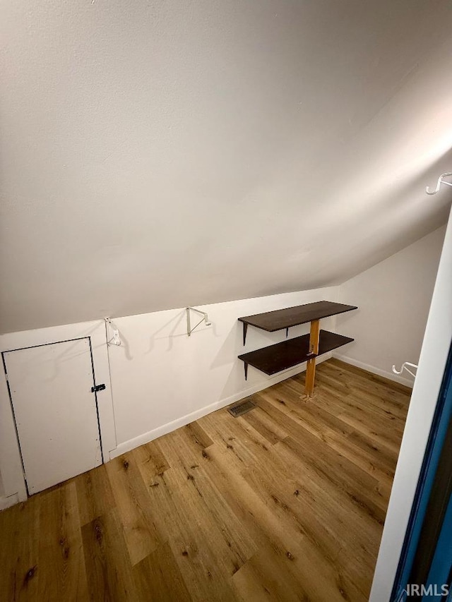 1228 N Main St, Kewanna, IN 46939 - spacious closet featuring wood finished floors and lofted ceiling
