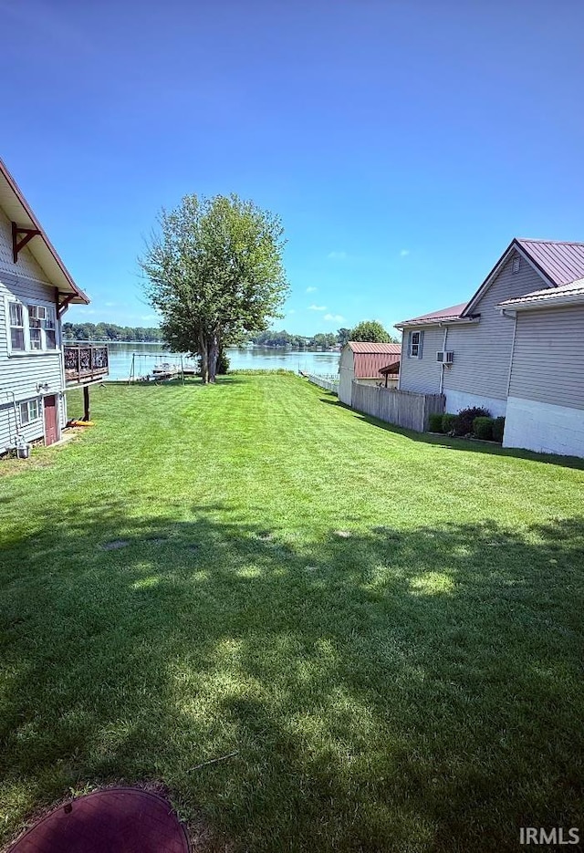 1228 N Main St, Kewanna, IN 46939 - view of grassy yard with a water view