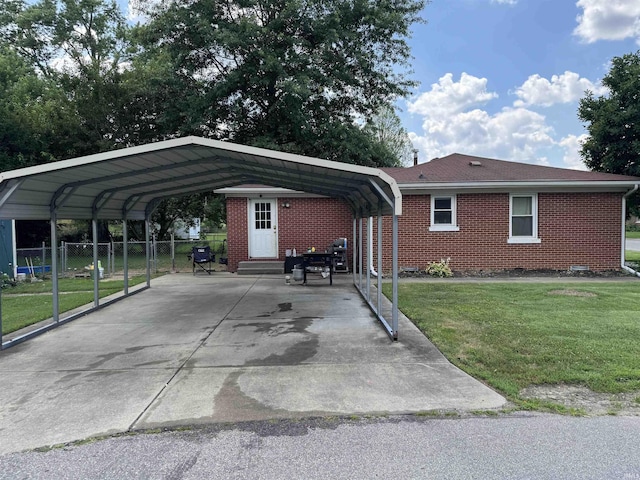 928 E Sherman St, Mount Vernon, IN 47620 - view of parking featuring a detached carport