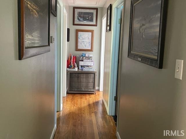 928 E Sherman St, Mount Vernon, IN 47620 - hall with wood finished floors and baseboards