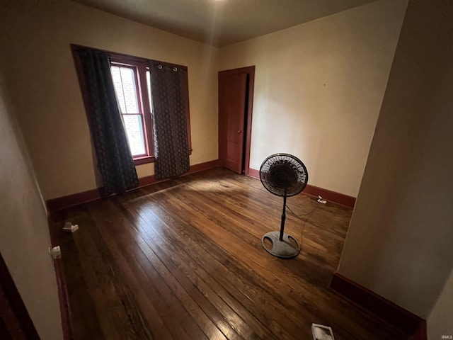 912 Broadway St, Vincennes, IN 47591 - empty room featuring hardwood / wood-style floors and baseboards