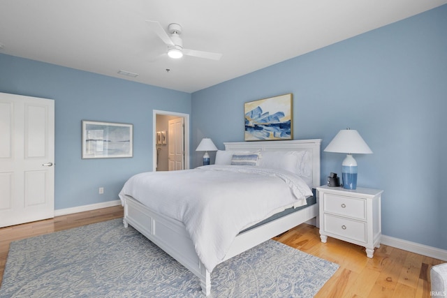 1219 Napoleon St Unit 217, South Bend, IN 46617 - bedroom featuring light wood-style floors and ceiling fan