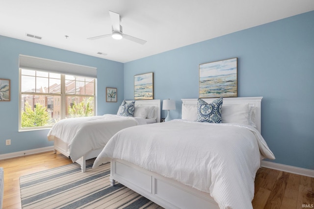 1219 Napoleon St Unit 217, South Bend, IN 46617 - bedroom featuring light wood-style floors and ceiling fan
