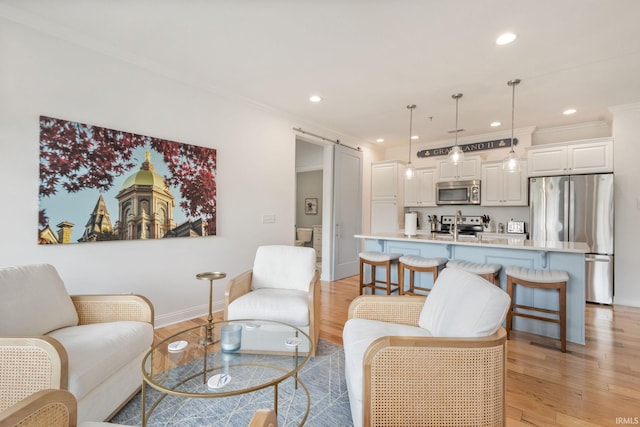 1219 Napoleon St Unit 217, South Bend, IN 46617 - living area featuring ornamental molding, recessed lighting, and light wood-style floors
