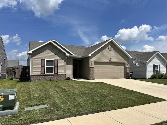 4805 Langhorn Trl, Lafayette, IN 47909 - ranch-style house with a garage, concrete driveway, brick siding, and a shingled roof