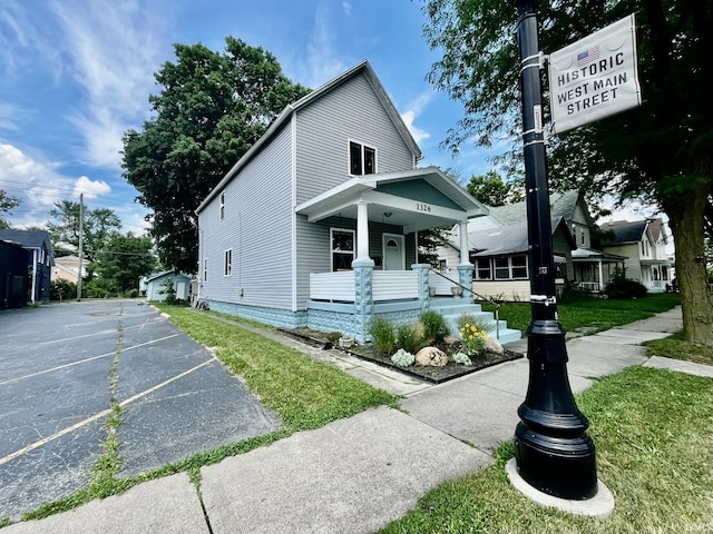 1326 W Main St, Fort Wayne, IN 46808 - view of front of house with covered porch and uncovered parking