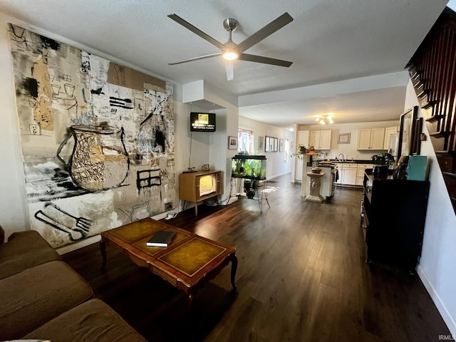 1326 W Main St, Fort Wayne, IN 46808 - living room featuring a ceiling fan and dark wood-type flooring