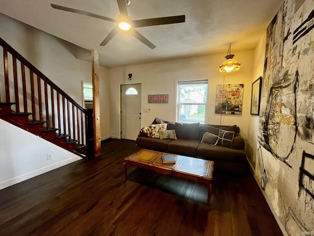 1326 W Main St, Fort Wayne, IN 46808 - living area with wood finished floors, ceiling fan, and stairs