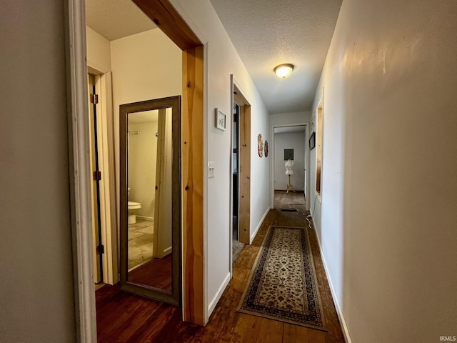 1326 W Main St, Fort Wayne, IN 46808 - hall featuring dark wood-style flooring and a textured ceiling
