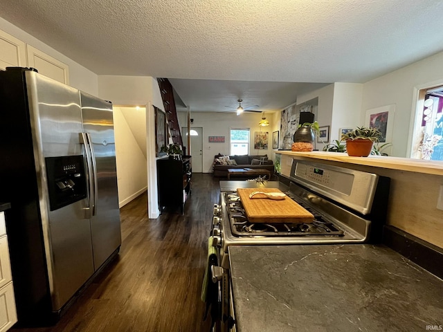 1326 W Main St, Fort Wayne, IN 46808 - kitchen with stainless steel appliances, dark wood finished floors, ceiling fan, white cabinetry, and open floor plan