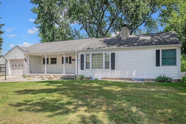 134 Marshall Blvd, Elkhart, IN 46516 - ranch-style home with an attached garage, a chimney, a front lawn, and covered porch