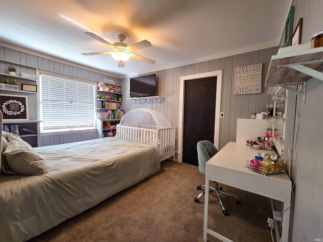 106 N Park Ave, Fowler, IN 47944 - carpeted bedroom featuring a desk, ceiling fan, and wooden walls
