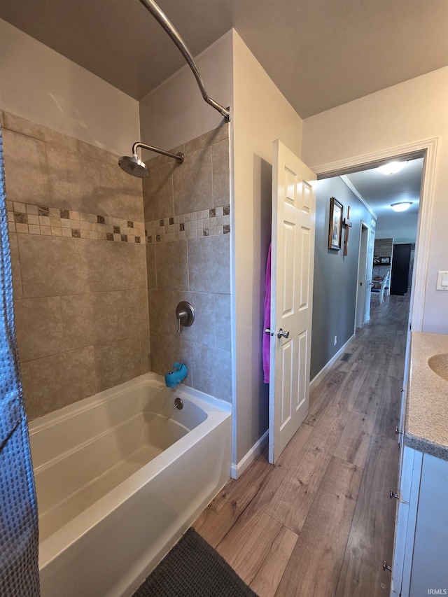 106 N Park Ave, Fowler, IN 47944 - full bathroom featuring wood finished floors, shower / tub combo, and vanity