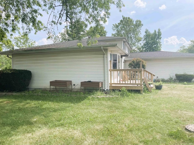 3681 W 75th Ct, Merrillville, IN 46410 - back of property with a yard and a deck