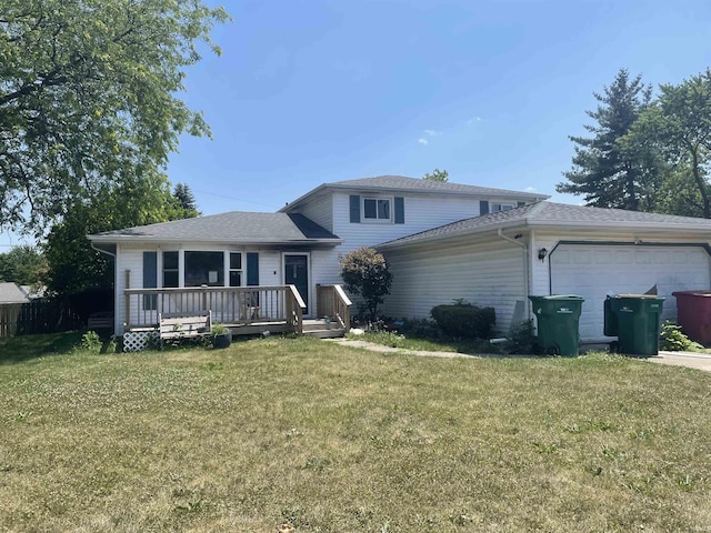 3681 W 75th Ct, Merrillville, IN 46410 - view of front of property featuring an attached garage, a front yard, a deck, and a shingled roof