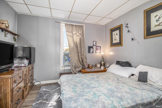 817 Middlebury St, Elkhart, IN 46516 - bedroom with wood finished floors and a paneled ceiling