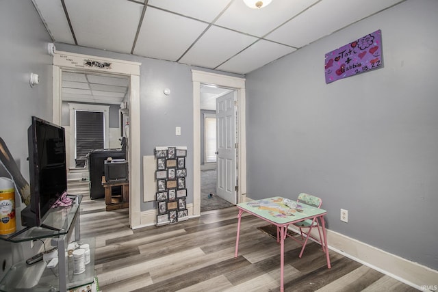 817 Middlebury St, Elkhart, IN 46516 - rec room with a paneled ceiling and wood finished floors