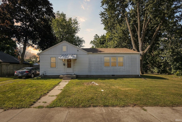 913 W Hubbard Ave, Elkhart, IN 46516 - view of front of house with board and batten siding and crawl space