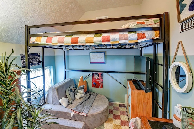 1931 Morton St, Lafayette, IN 47904 - bedroom with a textured ceiling and lofted ceiling