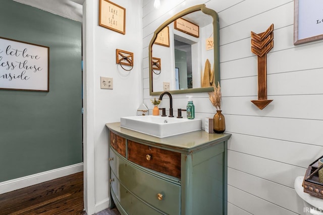 3331 Loral Dr, Anderson, IN 46013 - bathroom featuring vanity and wood finished floors