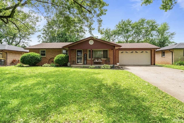3331 Loral Dr, Anderson, IN 46013 - ranch-style home featuring an attached garage, brick siding, driveway, a front yard, and a porch