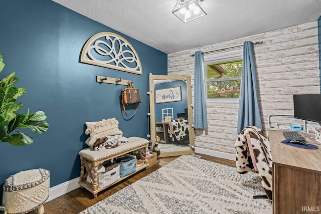 3331 Loral Dr, Anderson, IN 46013 - office area with an accent wall, a textured ceiling, and wood finished floors
