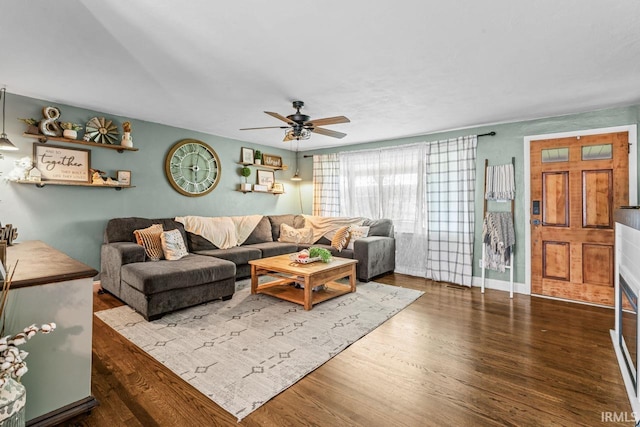 3331 Loral Dr, Anderson, IN 46013 - living area with a ceiling fan and wood finished floors