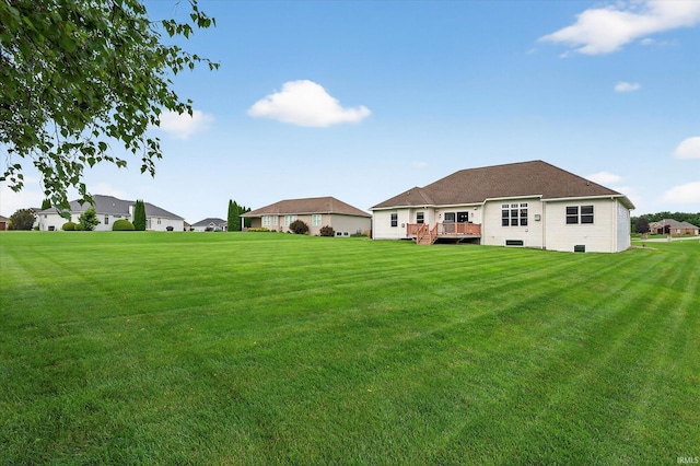 57907 Stone Creek Ct, Goshen, IN 46528 - view of grassy yard with a wooden deck