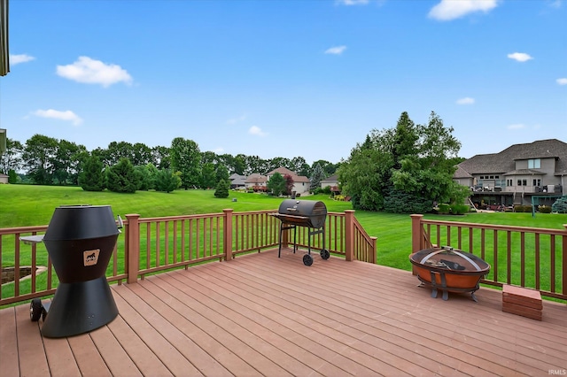 57907 Stone Creek Ct, Goshen, IN 46528 - wooden deck featuring an outdoor fire pit, a grill, a yard, and a residential view