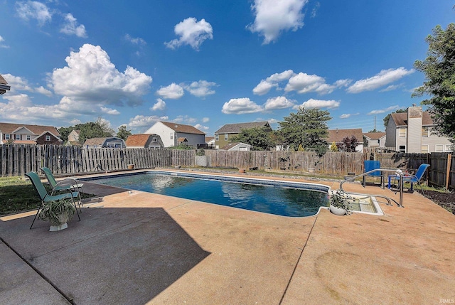 209 N Wilmington Ln, Lafayette, IN 47905 - view of swimming pool featuring a patio, a residential view, and a fenced backyard